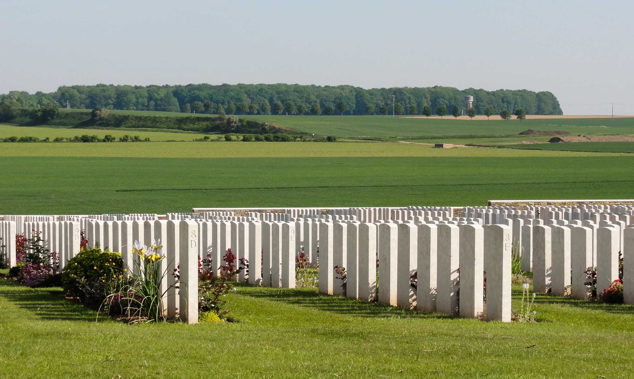 "Not the Butte but close by - a great photo.".  The killing fields leading up to Delville Wood- Guillemont Road cemetery in the foreground Taken by Bob Paterson November 2011