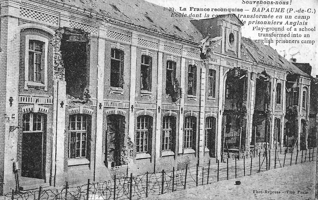 "P.O.W. camp in nearby Bapaume".  Superb older postcard showing school used by the Germans Taken by Property of Bob Paterson  WW1 era 